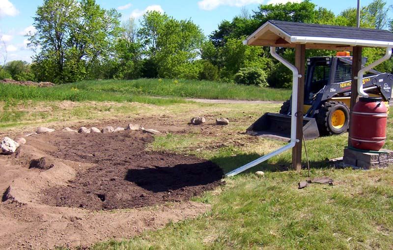 The Rain Garden was built by Street Department Employees Tom Koss, Steve Brooks and Pat Subel, & plants donated by Tom Koss. All plants used are local native Wisconsin Prairie plants.